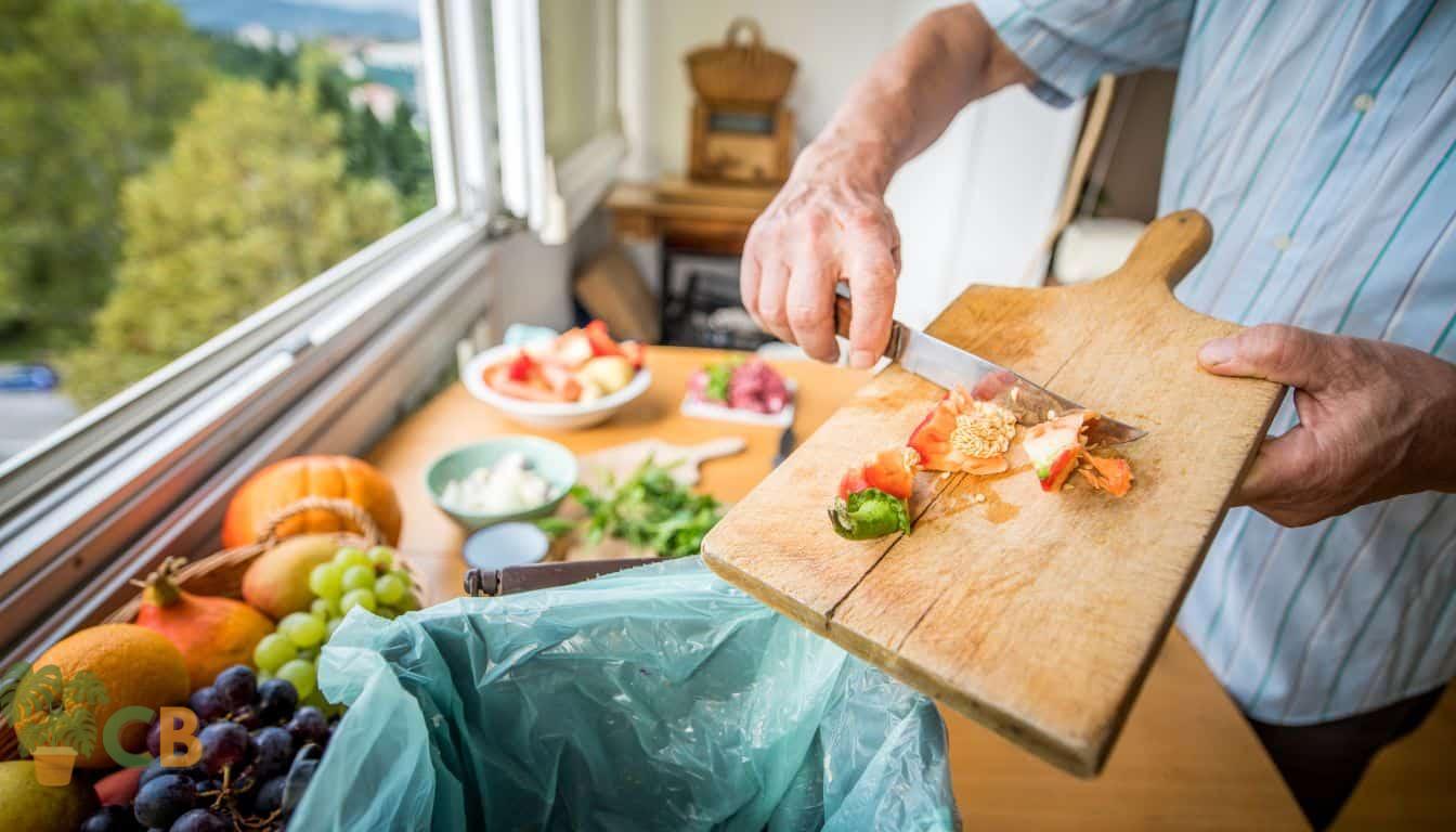 Putting food scraps into a bin ready for composting